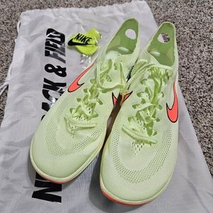 Neon Yellow Nike distance spikes